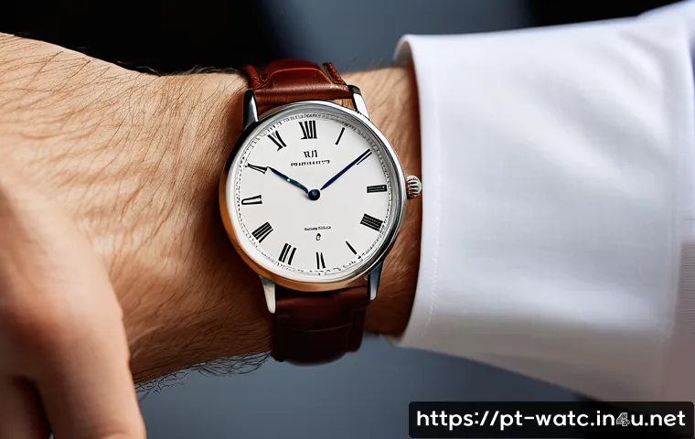 디지털 시계와 아날로그 시계 장단점 - A sophisticated wrist shot of a classic analog watch with a polished stainless steel case and a rich...